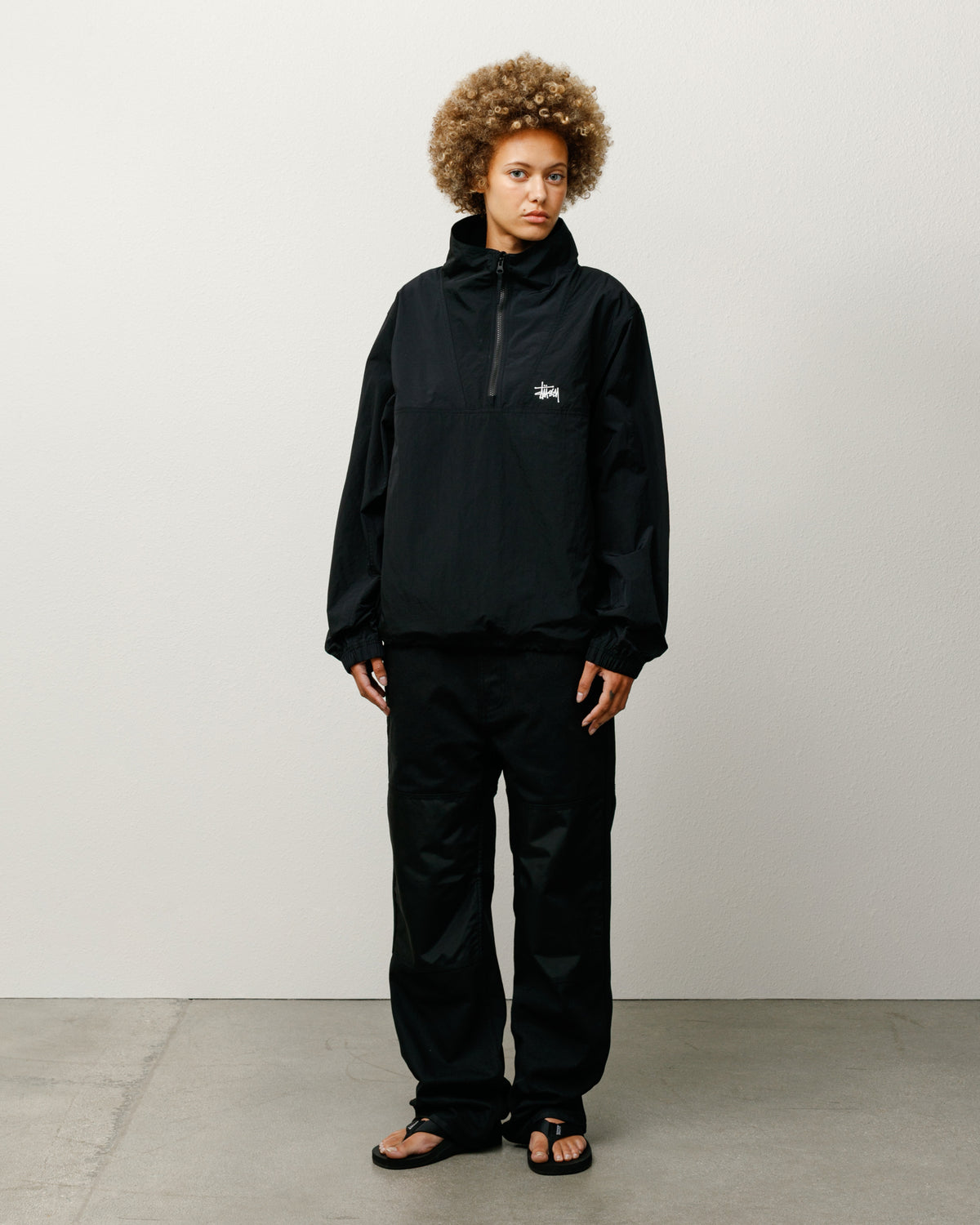 Warm Up Pullover – Black | Outerwear | Stüssy Japan