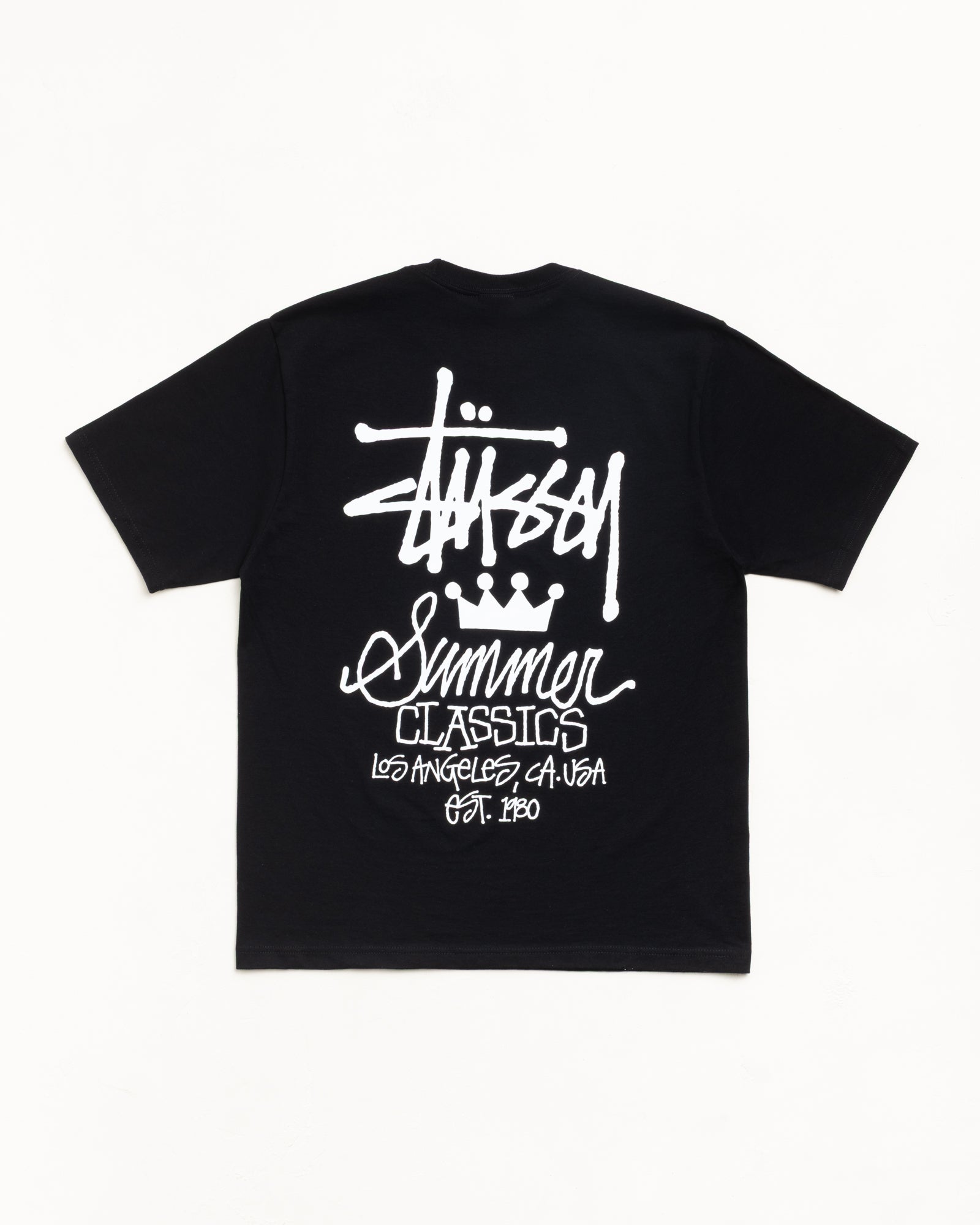 ブラックのユニセックス半袖Tシャツ、背面に大胆なホワイトグラフィックを配したコットンジャージーの定番デザイン